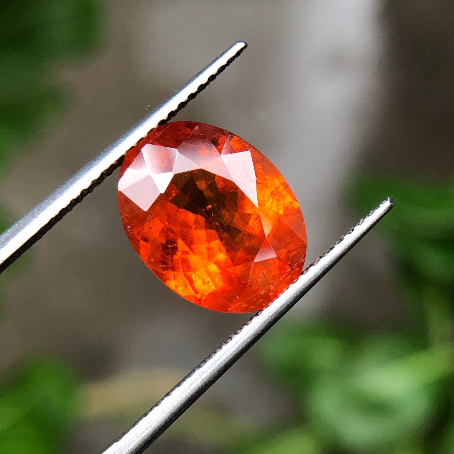 Natural spessartine garnet, 6.60 carat orange garnet oval.