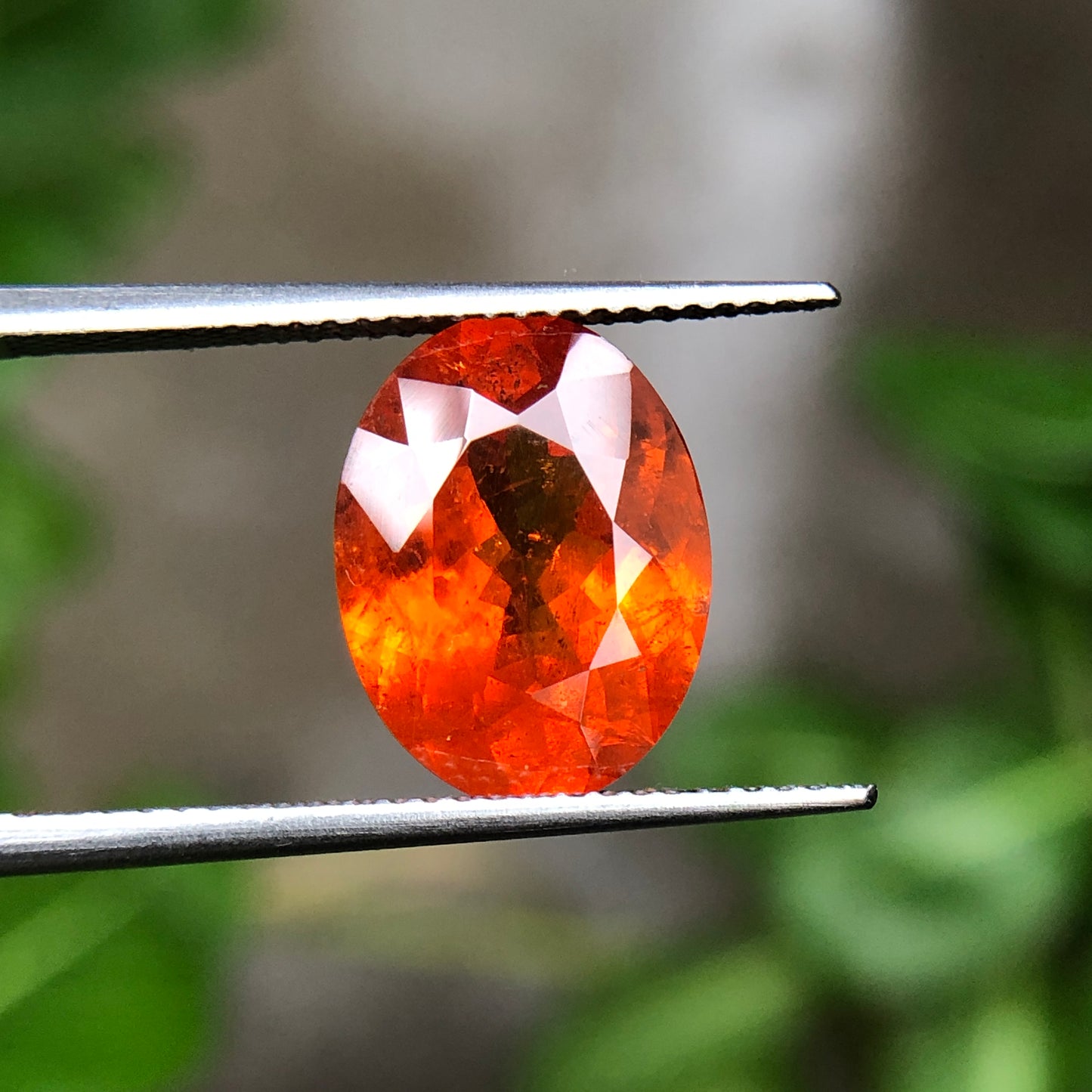 Natural spessartine garnet, 6.60 carat orange garnet oval.