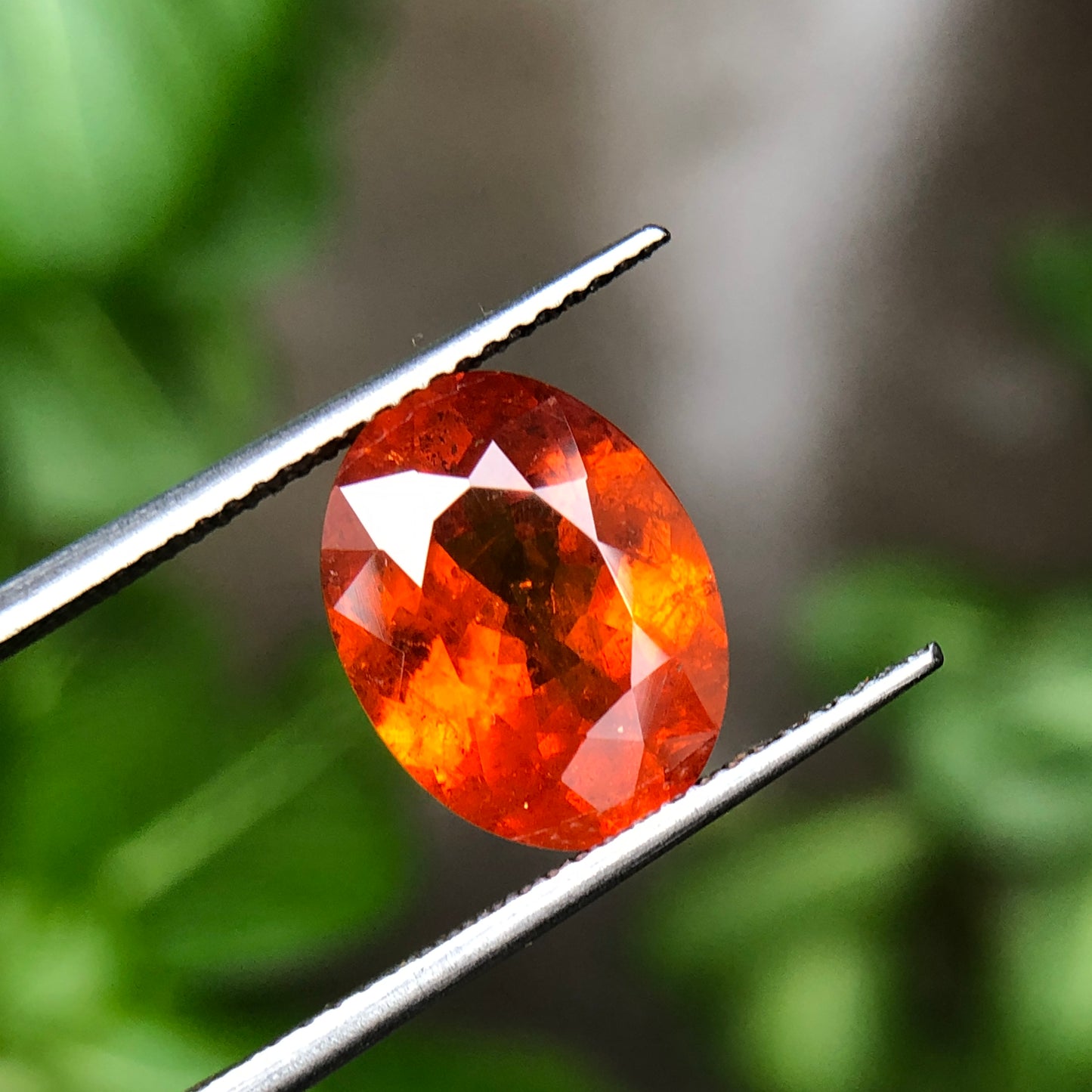 Natural spessartine garnet, 6.60 carat orange garnet oval.