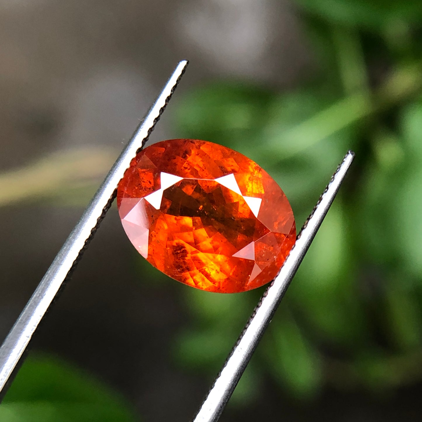 Natural spessartine garnet, 6.60 carat orange garnet oval.